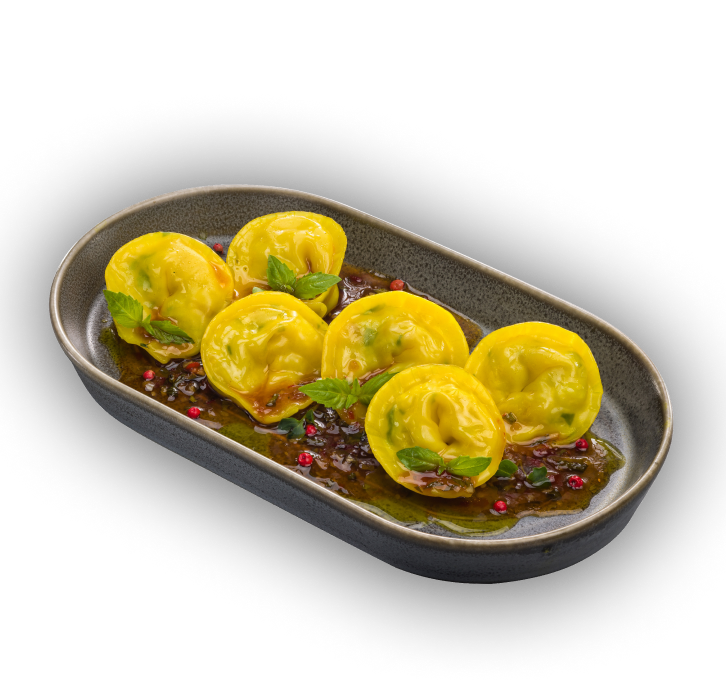 

Тортеллини с сибасом и гребешком